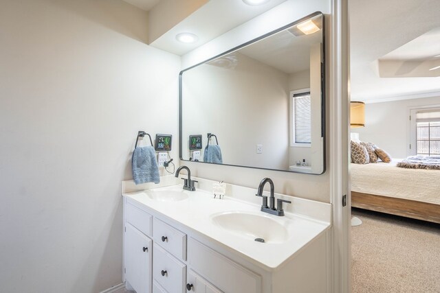 2223 S 2nd Pl, Lamesa, TX 79331 - full bathroom with connected bathroom, double vanity, and a sink