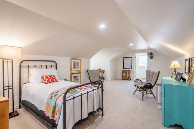 2223 S 2nd Pl, Lamesa, TX 79331 - bedroom featuring vaulted ceiling, light colored carpet, and recessed lighting