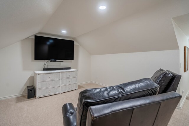 2223 S 2nd Pl, Lamesa, TX 79331 - living area with light carpet, baseboards, vaulted ceiling, and recessed lighting