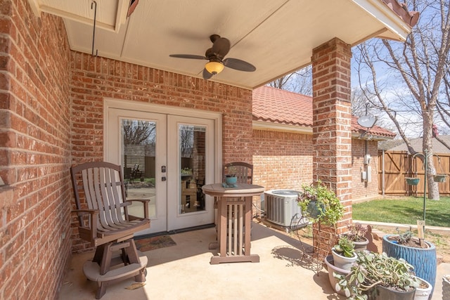 2223 S 2nd Pl, Lamesa, TX 79331 - view of patio featuring french doors, central AC unit, fence, and ceiling fan