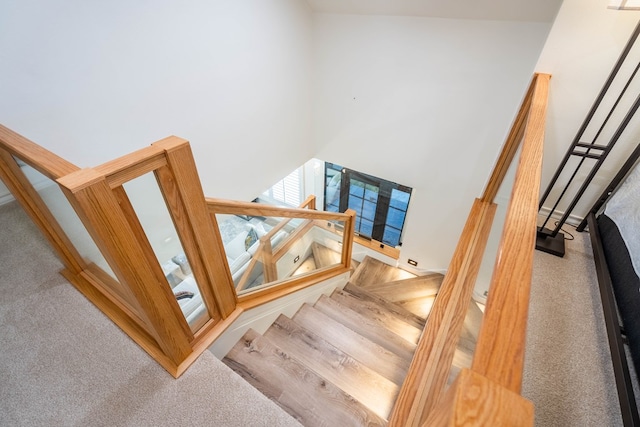 2223 S 2nd Pl, Lamesa, TX 79331 - stairway with a towering ceiling and carpet