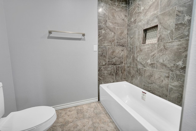 bathroom with toilet and a bathing tub