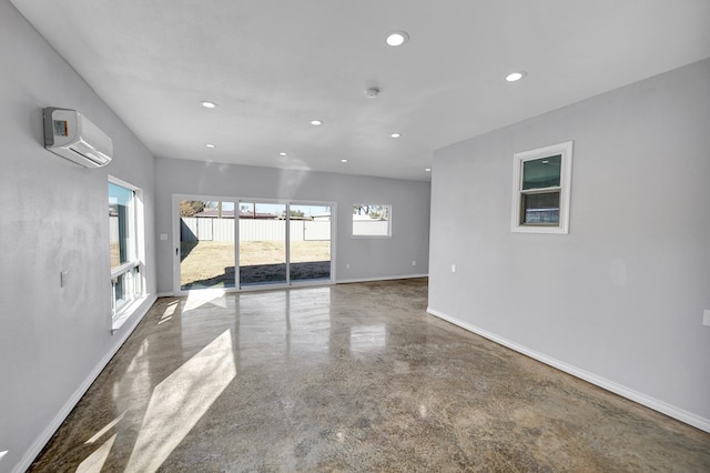 empty room with a wall mounted air conditioner