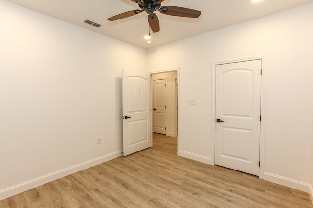 1202 Main St, Big Spring, TX 79720 - unfurnished bedroom with baseboards, light wood-type flooring, recessed lighting, and ceiling fan