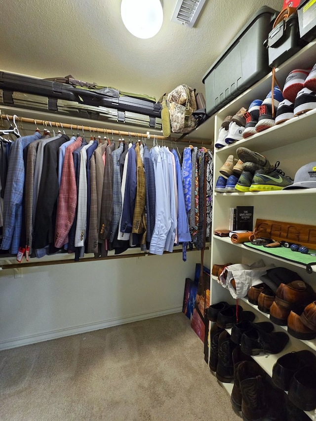 walk in closet with carpet flooring and visible vents