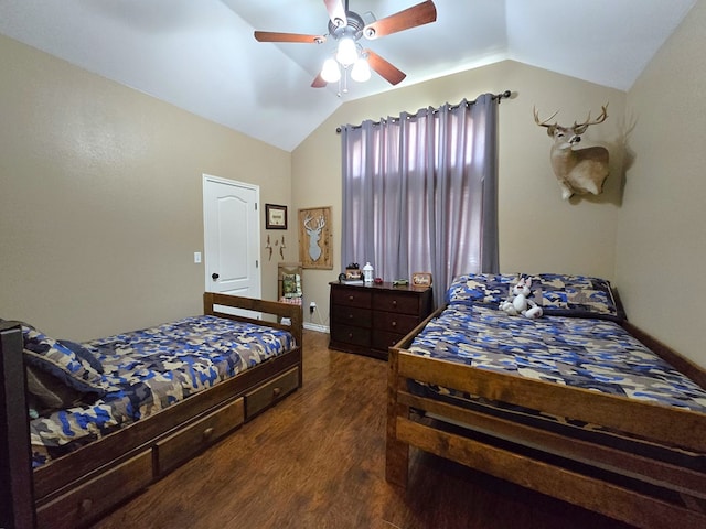 bedroom featuring baseboards, ceiling fan, vaulted ceiling, and wood finished floors
