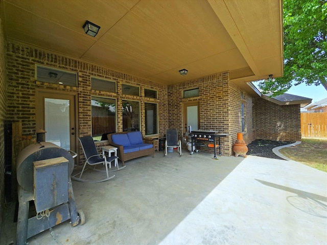 view of patio featuring fence