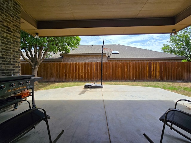 view of patio with a fenced backyard