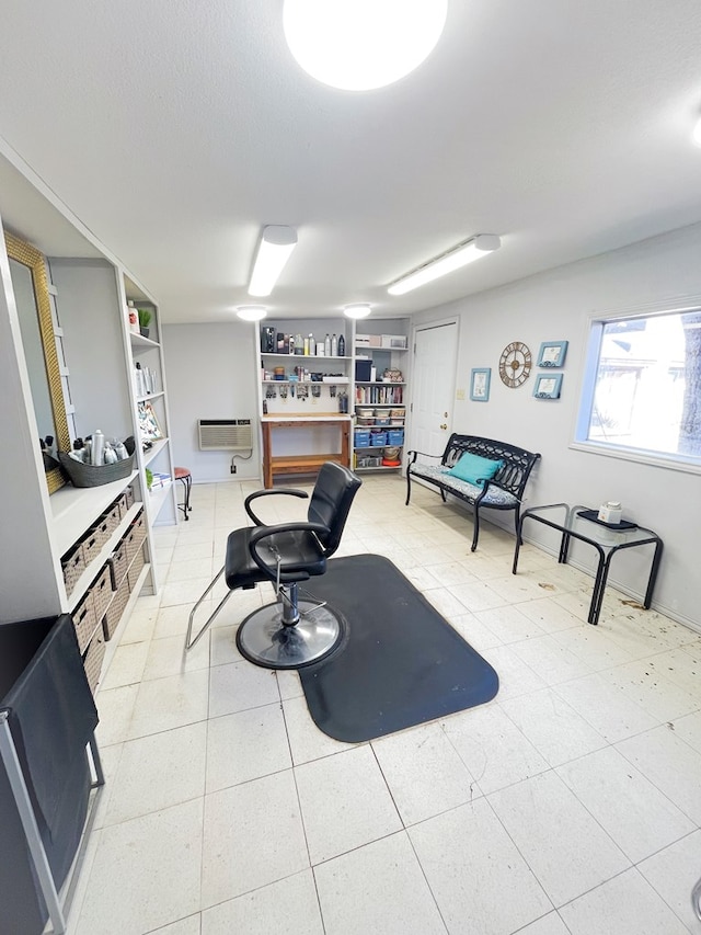 living room featuring a wall unit AC