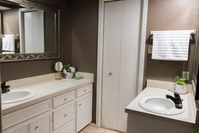 bathroom with vanity and tile patterned floors