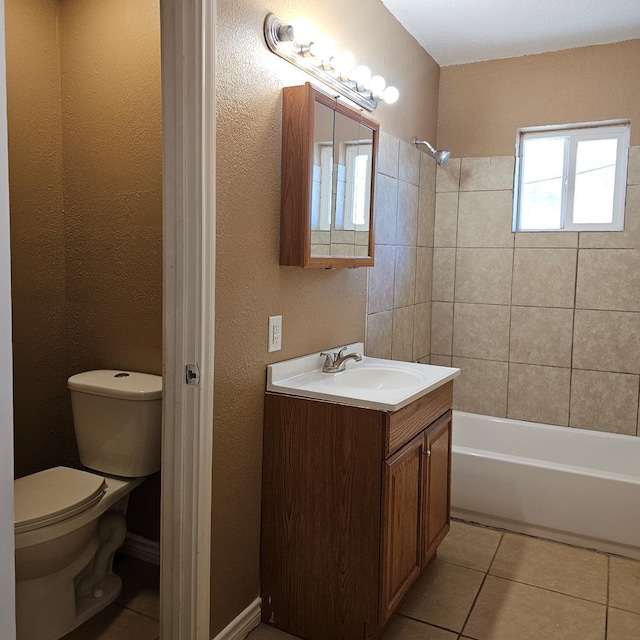 801 W Golf Course Rd, Midland, TX 79701 - full bath with vanity, toilet, tile patterned flooring, and washtub / shower combination