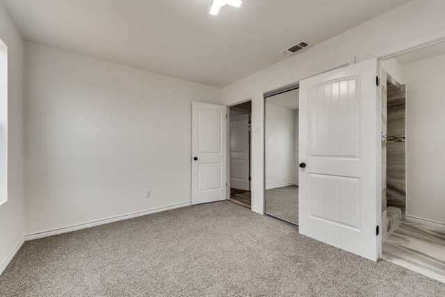 3004 W 4th, Odessa, TX 79763 - unfurnished bedroom featuring carpet floors and a closet