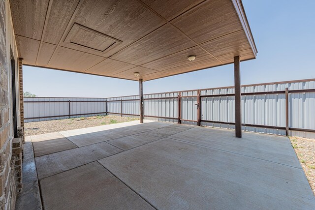 2894 SE 5001, Andrews, TX 79714 - fenced backyard with a patio