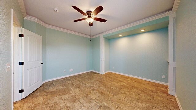 2894 SE 5001, Andrews, TX 79714 - unfurnished room featuring a ceiling fan, crown molding, a smoke detector, light stone finish flooring, and baseboards