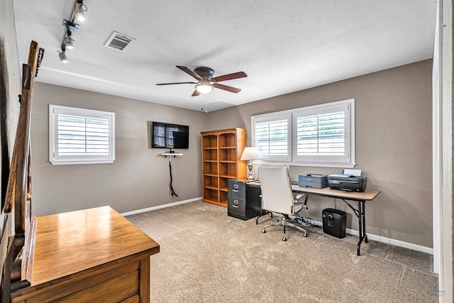 2512 Sinclair Ave, Midland, TX 79705 - carpeted office space featuring ceiling fan, baseboards, and track lighting