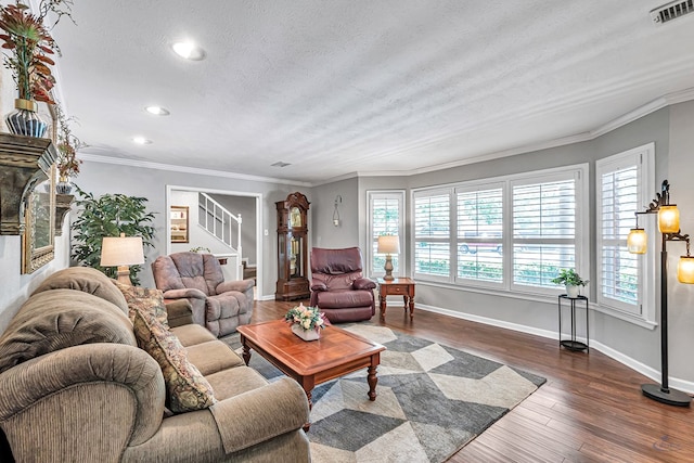 2512 Sinclair Ave, Midland, TX 79705 - living area with baseboards, stairs, recessed lighting, dark wood-style flooring, and crown molding