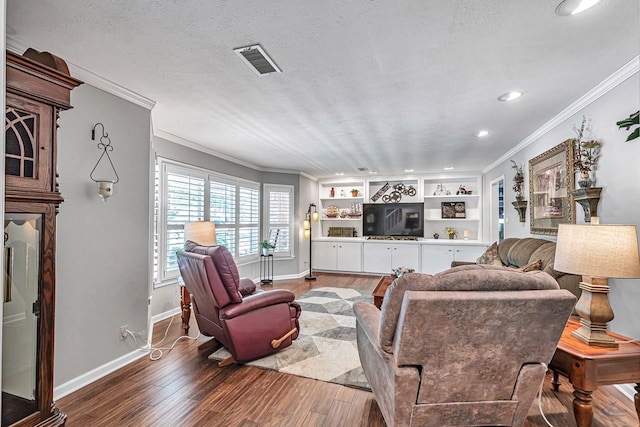 2512 Sinclair Ave, Midland, TX 79705 - living area with ornamental molding, wood finished floors, recessed lighting, and baseboards