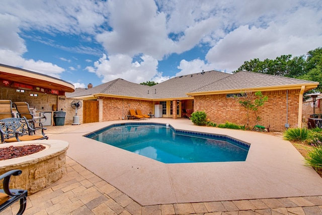 5500 Heartland Ct, Midland, TX 79707 - view of pool featuring an outdoor fire pit, a patio area, and french doors