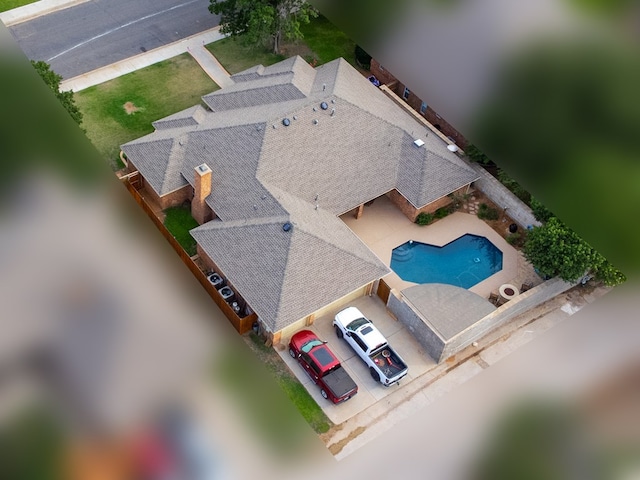 5500 Heartland Ct, Midland, TX 79707 - view from above of property with a pool