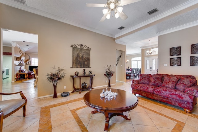5500 Heartland Ct, Midland, TX 79707 - living area featuring inlaid floor details, ceiling fan, light tile patterned floors, crown molding, and a textured ceiling
