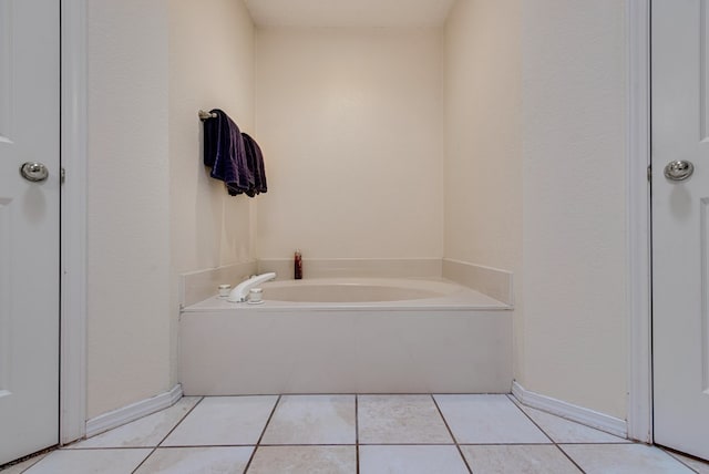 5500 Heartland Ct, Midland, TX 79707 - full bathroom with a garden tub and tile patterned flooring