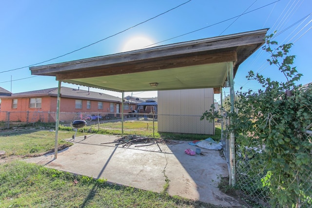 view of patio / terrace featuring a carport