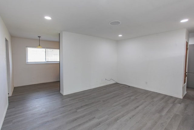 empty room featuring light hardwood / wood-style floors