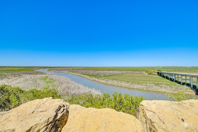 view of water feature with a rural view