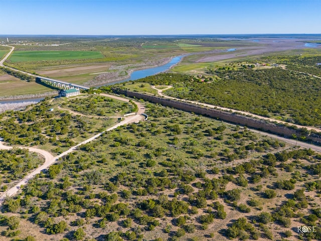 bird's eye view featuring a water view and a rural view