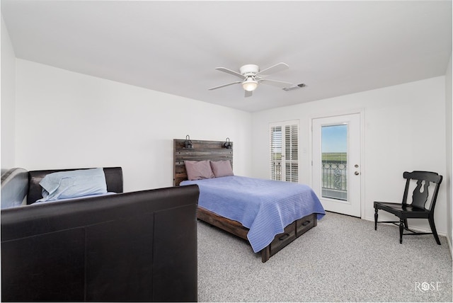 bedroom with access to exterior, carpet flooring, and ceiling fan