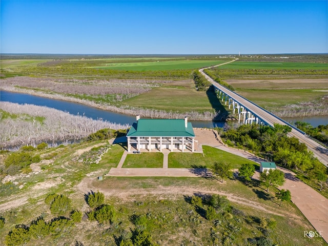 bird's eye view with a water view and a rural view