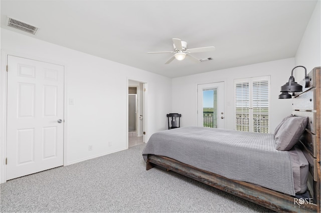 bedroom featuring ceiling fan, access to exterior, and carpet floors