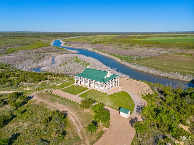 drone / aerial view with a rural view and a water view