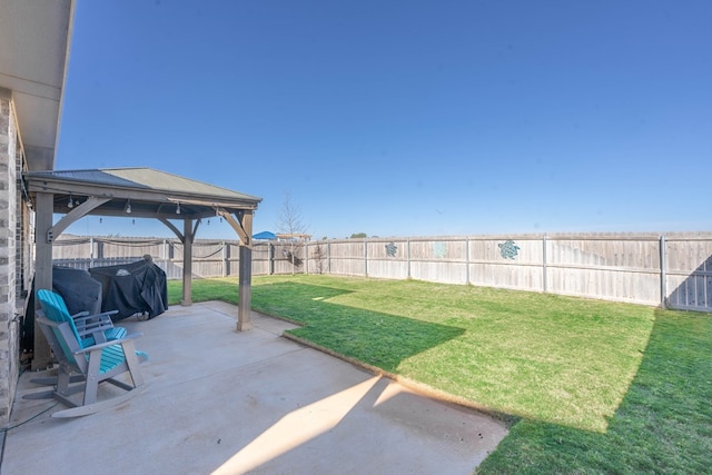 view of yard with a gazebo and a patio