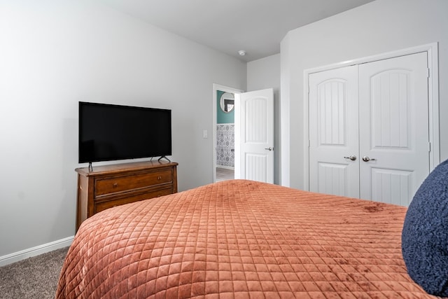 bedroom with carpet floors and a closet