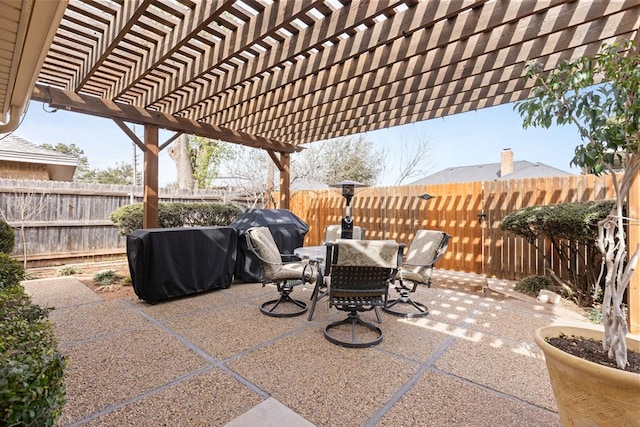 6413 Piedmont Dr, Odessa, TX 79762 - fenced backyard with outdoor dining area, grilling area, a patio, and a pergola