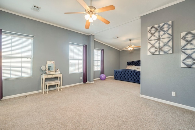 carpeted bedroom with vaulted ceiling, ceiling fan, and crown molding