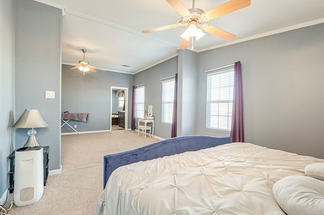 carpeted bedroom featuring ceiling fan and crown molding