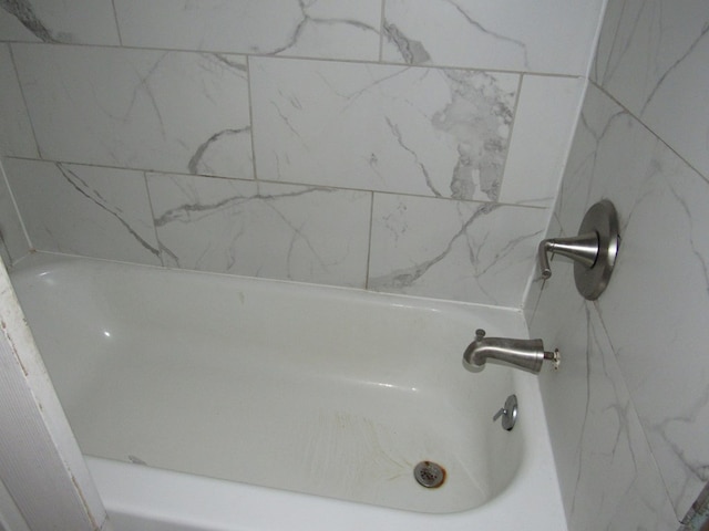 full bath with a tub to relax in