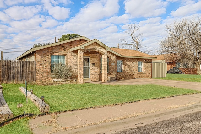 view of front of home with a front yard