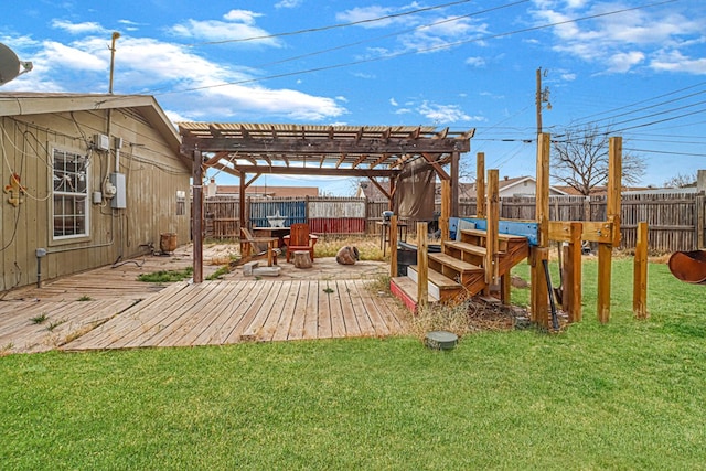 view of yard featuring a deck and a pergola