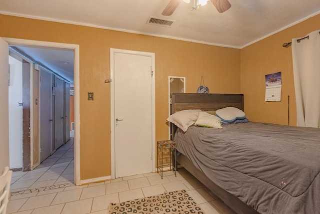 1304 Lynn Ave, Midland, TX 79705 - bedroom with crown molding, tile patterned flooring, and ceiling fan