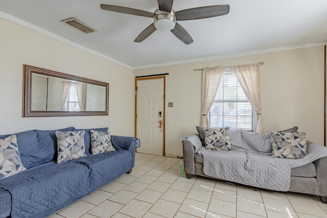 1304 Lynn Ave, Midland, TX 79705 - living area featuring light tile patterned flooring, ceiling fan, and ornamental molding