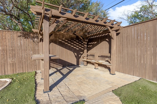 view of patio featuring a pergola