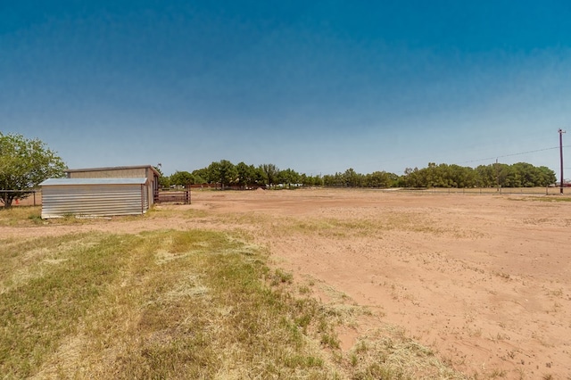2429 S County Rd 1120, Midland, TX 79706 - view of yard with an outdoor structure and a rural view