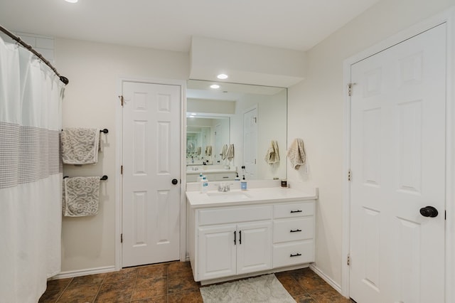 2429 S County Rd 1120, Midland, TX 79706 - full bath with vanity and recessed lighting