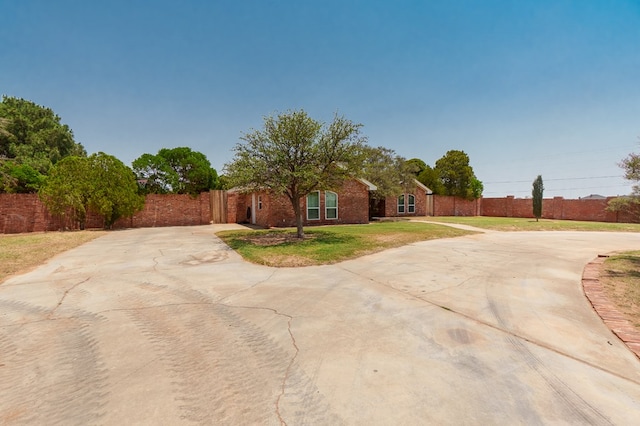 2429 S County Rd 1120, Midland, TX 79706 - view of side of home with curved driveway