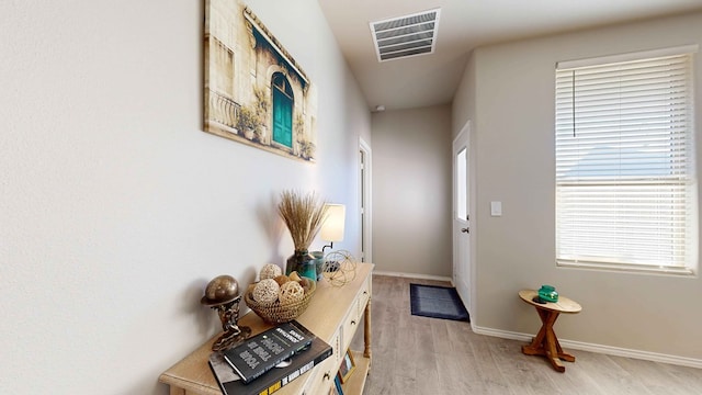 hall featuring light hardwood / wood-style flooring