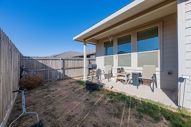 view of patio / terrace featuring a fire pit