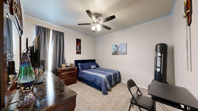 bedroom with ceiling fan and light colored carpet